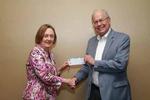 Dr. Sigfrid Muller donates $1000 to provide scholarships for the XI ICD